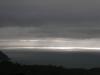 Boj svitu s mraky nad Coromandel - Nový Zéland